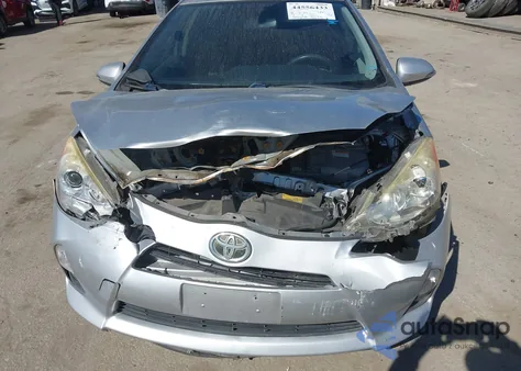 2014 Toyota Prius C Three from USA, damaged, VIN JTDKDTB3XE1565086